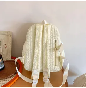 Cute light yellow textured student backpack, casual daily double shoulder bag for girls.