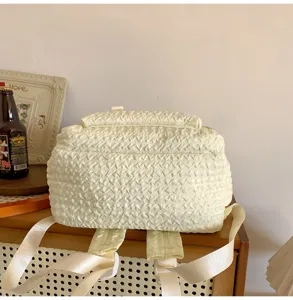 Sweet girl pleated texture backpack detail view, soft cute style junior high school student bag.