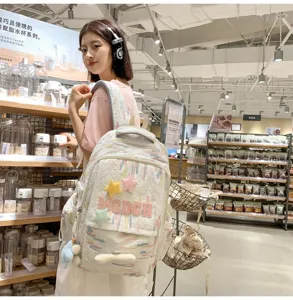 Japanese ins style casual backpack with cute star plush decoration and stylish daily school bag