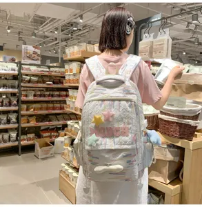 Japanese ins style casual backpack with cute plush stars and colorful pattern for daily school.