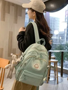 Cute light green casual backpack for girls students sweet school bag with plush bunny pendant.