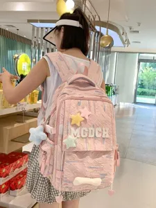 Japanese ins style pink casual backpack with star patches and MGDCH letter for school daily use