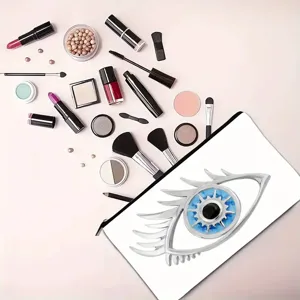Vista detallada de un neceser de maquillaje blanco con diseño de ojo azul.