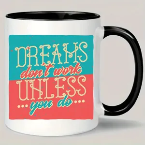Detail view of a ceramic coffee mug with motivational quote print, office desk accessory.