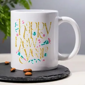 White ceramic coffee mug with gold glitter happy new year print for office or home daily use
