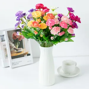Artificial rose bouquet detail showing vibrant multi-color tea roses in white vase for home decor.