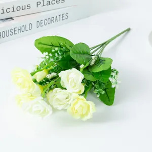 Artificial silk rose flower bouquet detail, light yellow floral arrangement for home decor.