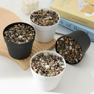 Nordic minimalist flower pots with decorative stones, small plant pots for succulent plants.