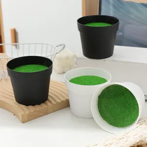 Nordic minimalist plastic flower pots with green moss detail, ideal for indoor plants display.