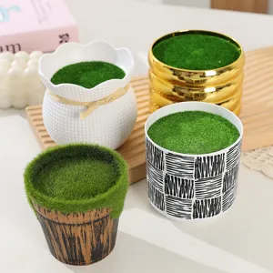 Nordic minimalist succulent flower pot with green moss decoration for home desktop and office decor.
