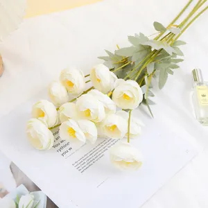 White artificial tea rose flower bouquet for home decoration and photography prop.