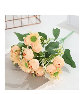 Close-up of artificial peach daisy flower bouquet detail, ideal for home decor and wedding props.