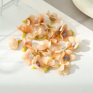 Mini künstliche Blumenköpfe aus Seidenstoff, pfirsichfarben, perfekt für DIY Basteln.