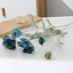 Artificial blue poppy flower detail, flocked stems and realistic petals for home decor display.