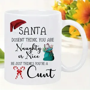White ceramic coffee mug with funny Christmas graphic text design for office home daily use.