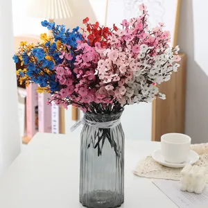 Artificial fake flowers colorful baby breath bouquet in glass vase for home decor