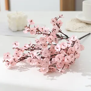 Artificial cherry blossom branch silk flowers for home wedding decor, pink floral arrangement.