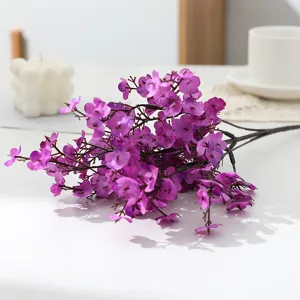 Detailed view of the artificial purple baby breath flowers, perfect for home decor display.