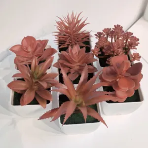 Künstliche Sukkulenten im Topf, herbstfarbene Plastikblumen für DIY Heimdekoration Details.
