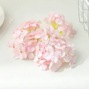 Artificial pink hydrangea flower heads for DIY crafts, wedding decor and gift box packaging.