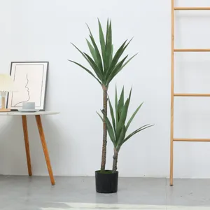 Gedetailleerd overzicht van de kunstmatige potplant met dubbele stam voor uw interieurdecoratie.