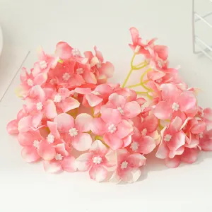 Artificial pink hydrangea flower head detail close up view for DIY crafts and floral arrangements