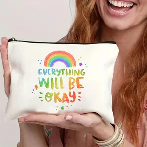 Graziosa borsa cosmetica in tela con arcobaleno e citazione motivazionale per accessori.