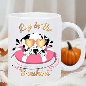 Cute dalmatian dog ceramic mug detail shot, pink swim ring cartoon print, coffee cup.