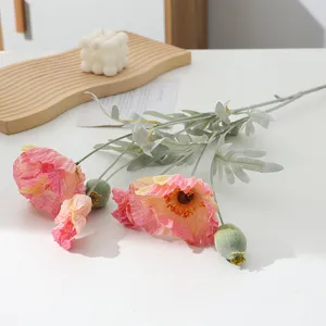 Detail view of artificial poppy flower branch, flocked silk floral decor for home.