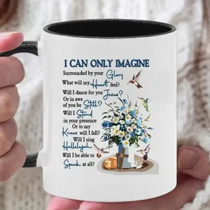 Ceramic coffee mug with inspirational religious lyrics print, black handle and interior.