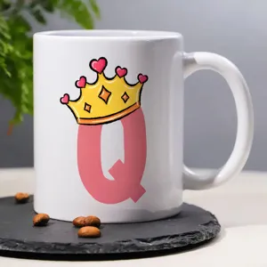 White ceramic coffee mug with letter Q and crown design, perfect for office and daily use.