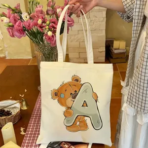 Borsa tote in tela casual con simpatica stampa di orsetto, ideale per l'uso quotidiano.