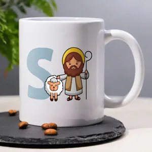 Detailed view of white ceramic coffee mug with custom cute cartoon shepherd print.
