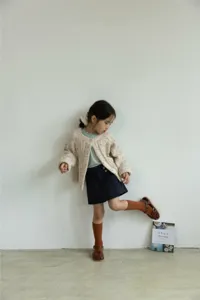Cardigan in maglia maculata per bambini, capospalla caldo e accogliente per la stagione autunnale.