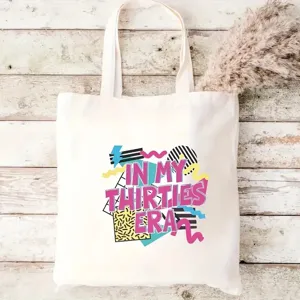 Borsa shopper in tela casual con stampa grafica retrò anni '80, perfetta per la spesa quotidiana.