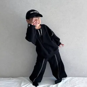 Kids black sweatshirt set long sleeve two piece athletic casual outfit with drawstring.