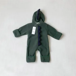 Baby fleece dinosaur hooded jumpsuit detail view, showing the warm fabric and cute design.