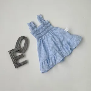 Baby girl blue plaid smocked strap dress detail, cute ruffle hem sleeveless summer apparel.