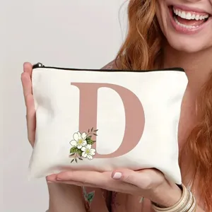 Trousse de maquillage en toile avec lettre D et motif floral, cadeau organisateur de voyage.