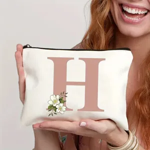 Trousse de maquillage personnalisée avec motif de fleurs, pochette de voyage idéale.