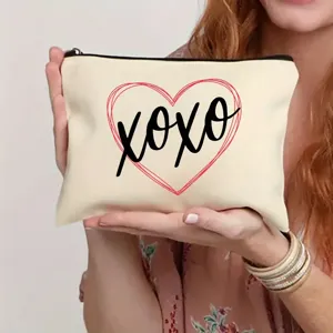 Canvas zipper makeup bag with cute XOXO heart print, portable cosmetic pouch for daily use.
