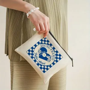 Elegante astuccio per cosmetici in tela con grafica a quadri blu e scritta alla moda.