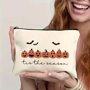 Halloween pumpkin print cosmetic bag detail view, casual canvas makeup pouch with zipper.
