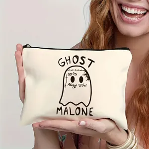 Nahaufnahme einer Halloween Geist Leinwand Kosmetiktasche mit einzigartigem Grafikdesign.