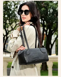 Black crocodile pattern leather Boston shoulder bag, fashionable commuting handbag for women.