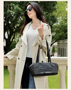 Black crocodile pattern leather Boston handbag, chic commuting shoulder bag with double handles.