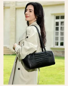 Black crocodile pattern leather boston shoulder bag for women, chic commuting handbag.