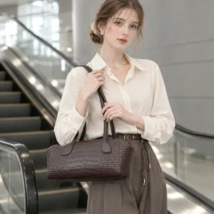 Stylish women's brown crocodile pattern leather Boston shoulder bag, perfect for daily commuting.