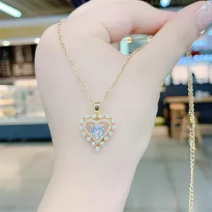 Elegant heart pearl necklace with sparkling crystals, chic gold clavicle chain for women fashion.
