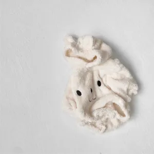 Detailed shot of fluffy fleece baby hooded romper with cute bear embroidery and soft fabric.